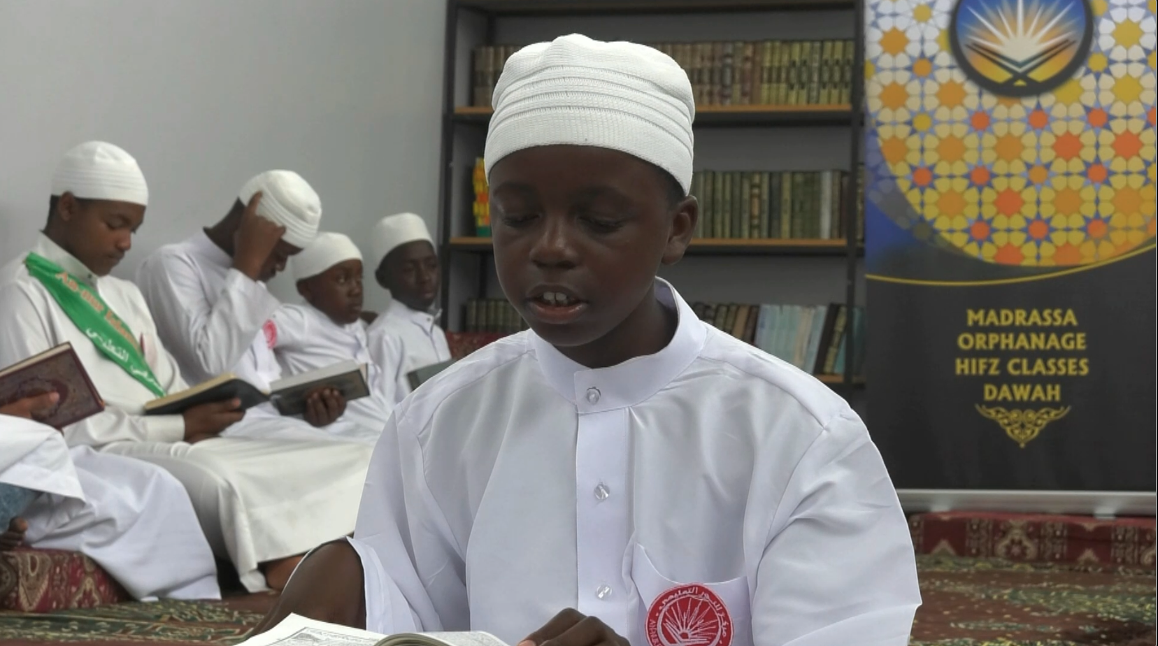 one of annur new muslims learning quraan